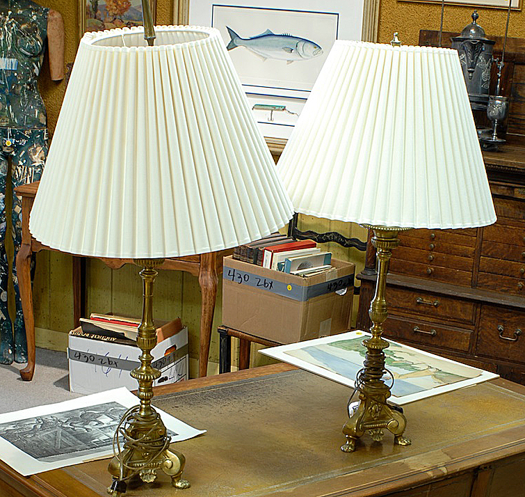 Appraisal: PAIR OF CONTEMPORARY BRASS PAW FOOT CANDLESTICKS electrified as table