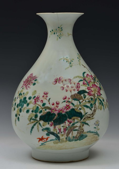 Appraisal: A CHINESE PEAR-SHAPED VASE with waisted neck and trumpet mouth