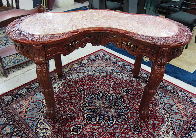 Appraisal: CARVED MAHOGANY TABLE DESK European Rococo design having a marble