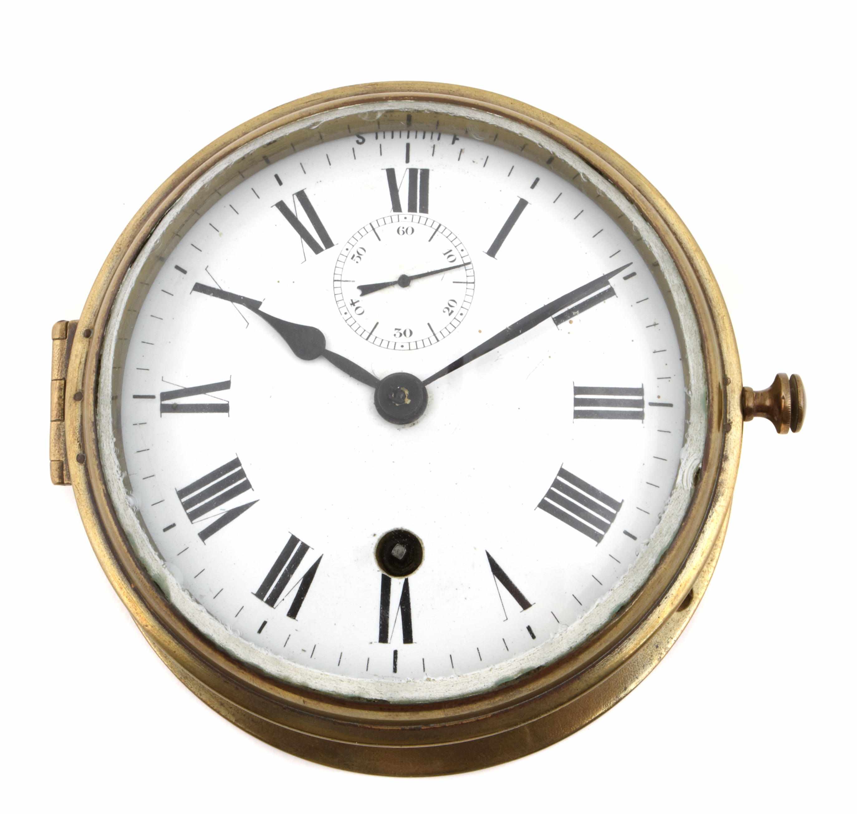 Appraisal: A brass ship's bulkhead timepiece The circular enamel dial with