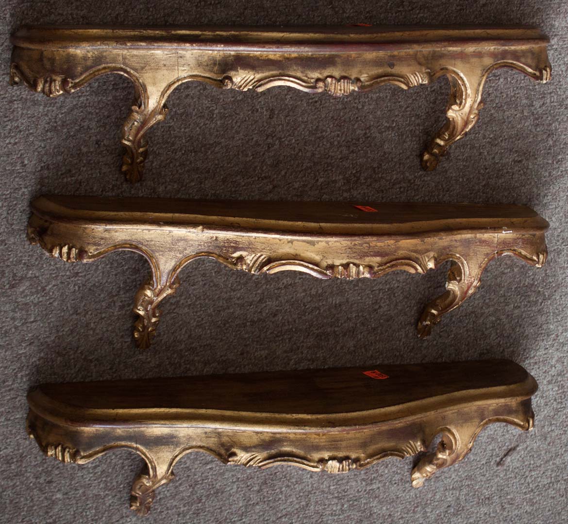 Appraisal: a Three gilt wall shelves