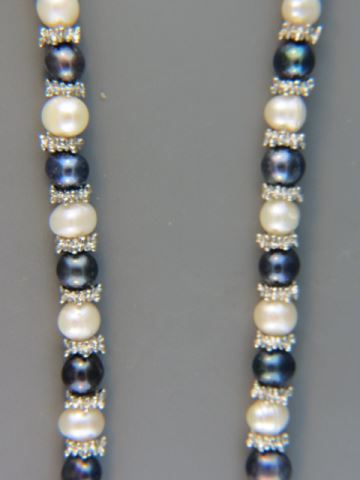 Appraisal: Pearl Necklace alternation black white pearls mm long