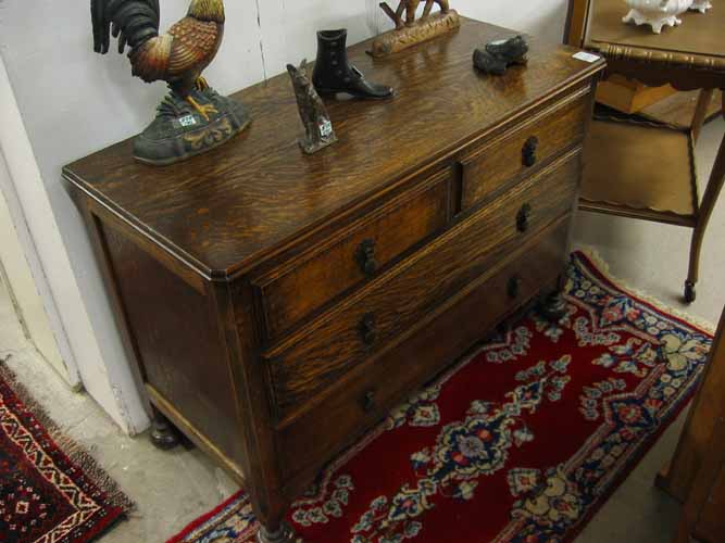 Appraisal: LOW OAK CHEST OF DRAWER English first half of the