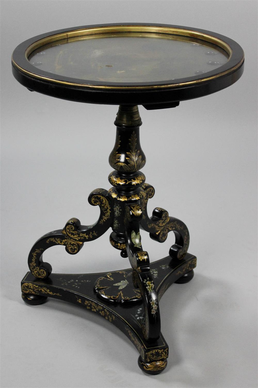 Appraisal: VICTORIAN GILT DECORATED BLACK LACQUER TRIPOD TABLE inset with a