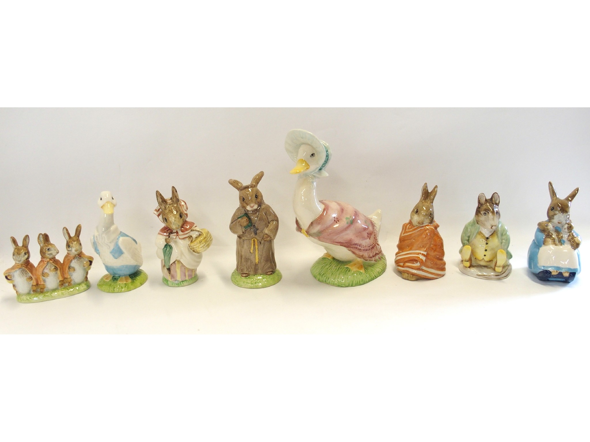 Appraisal: Seven Beatrix Potter figures including large Jemima Puddleduck Mrs Rabbit