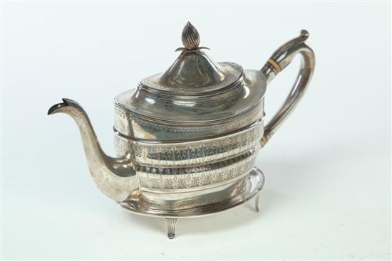 Appraisal: GEORGE III SILVER TEAPOT AND STAND Both marked for London