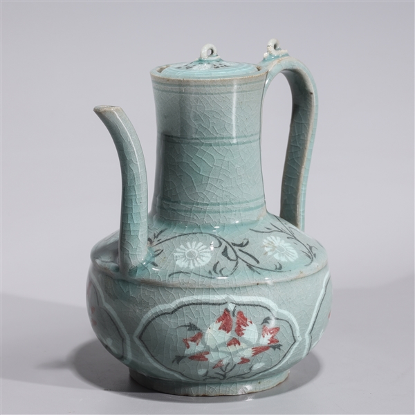 Appraisal: Korean celadon glazed covered ewer with elaborate floral designs overall