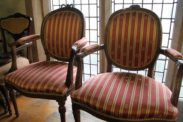 Appraisal: A PAIR OF FRENCH BEECHWOOD FRAMED FAUTEILS each with red