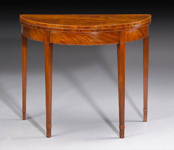 Appraisal: A George III crossbanded mahogany games table late th century