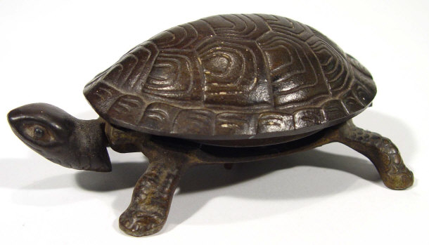 Appraisal: Cast metal tortoise table bell cm in length