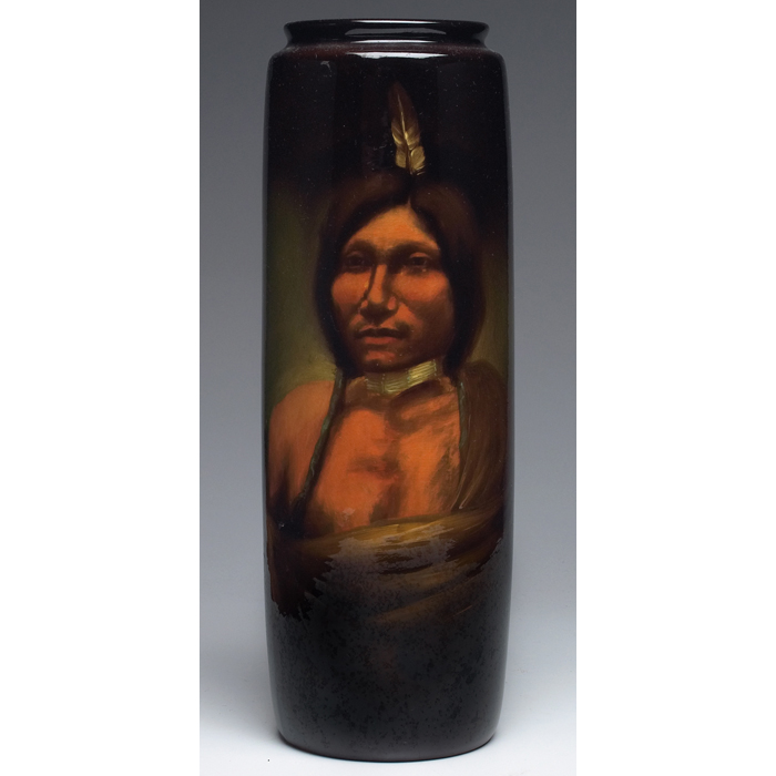 Appraisal: Weller Louwelsa vase cylindricalshape finely painted portrait of a NativeAmerican