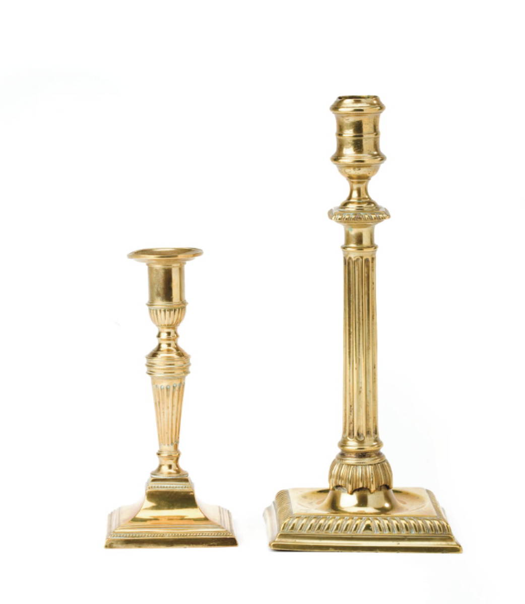 Appraisal: TWO NEOCLASSICAL BELL METAL AND BRASS CANDLESTICKS WITH FLUTED STEMS