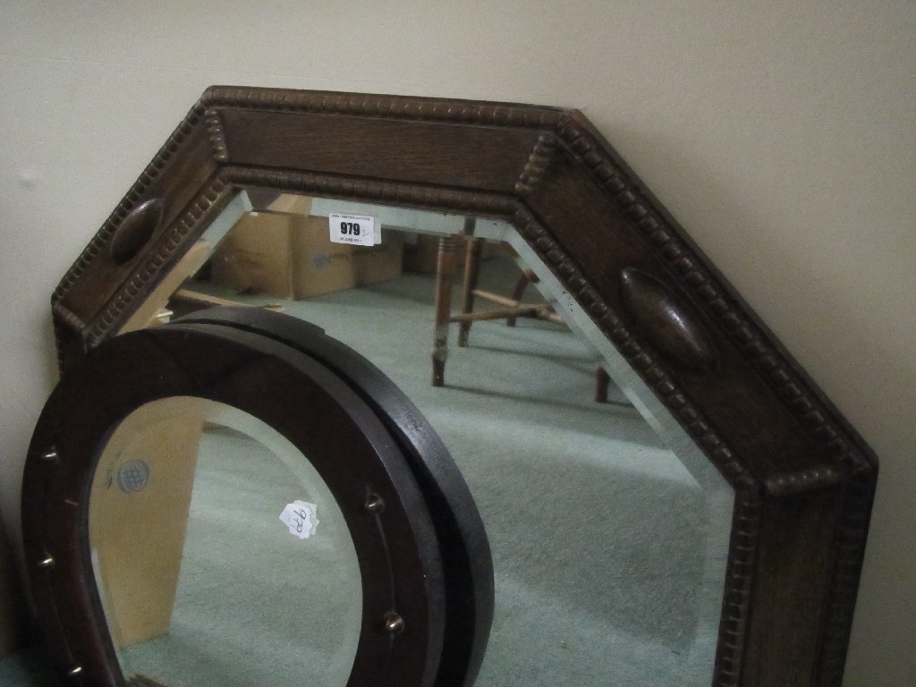 Appraisal: Oak octagonal wall mirror and a horseshoe shaped wall mirror