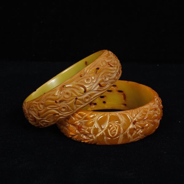 Appraisal: Two Pierce Carved Floral Bakelite Bangle Bracelets dia