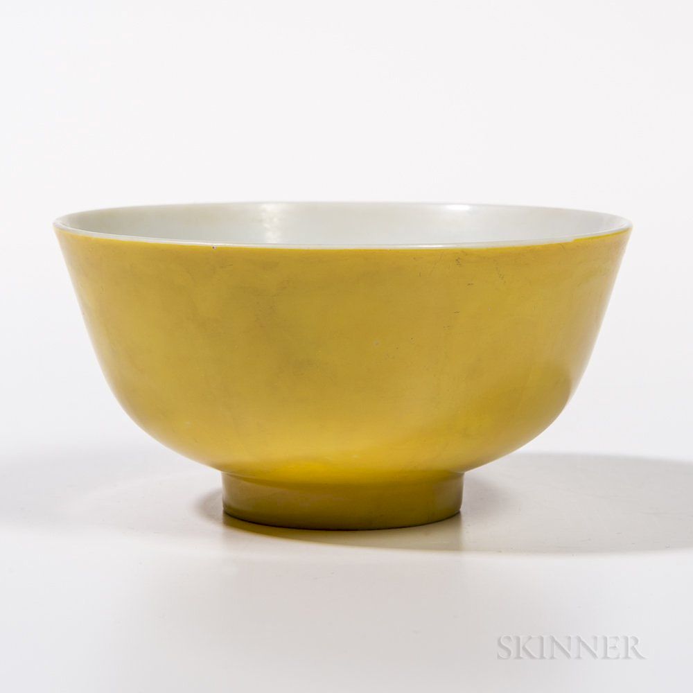 Appraisal: Yellow-glazed Bowl Yellow-glazed Bowl China th th century shallow bowl