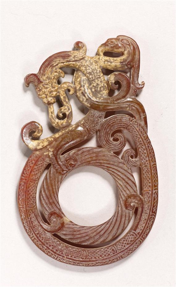 Appraisal: A JADE PENDANT China L cm Rust brown jade