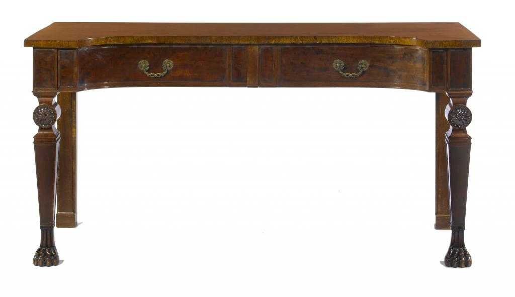 Appraisal: A MAHOGANY SERVING TABLE the line inlaid concave top fitted