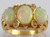 Appraisal: An carat gold opal and diamond ring hallmarked London the