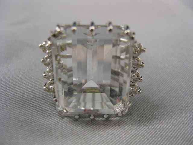 Appraisal: White Sapphire Diamond Ring carat sapphire with diamonds on each