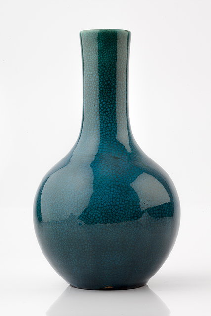 Appraisal: A Chinese monochrome bottle vase th Centurydecorated with dark turquoise