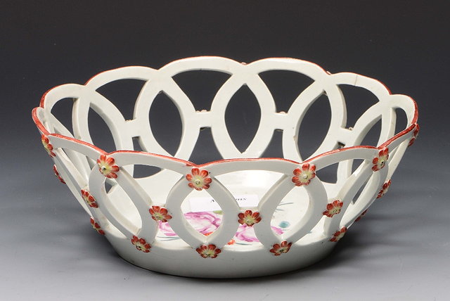 Appraisal: A WORCESTER PORCELAIN BASKET with polychrome summer flower decoration and