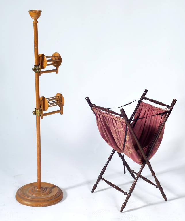 Appraisal: th CENTURY BEECH WOOL WINDER with cup-topped standard and two