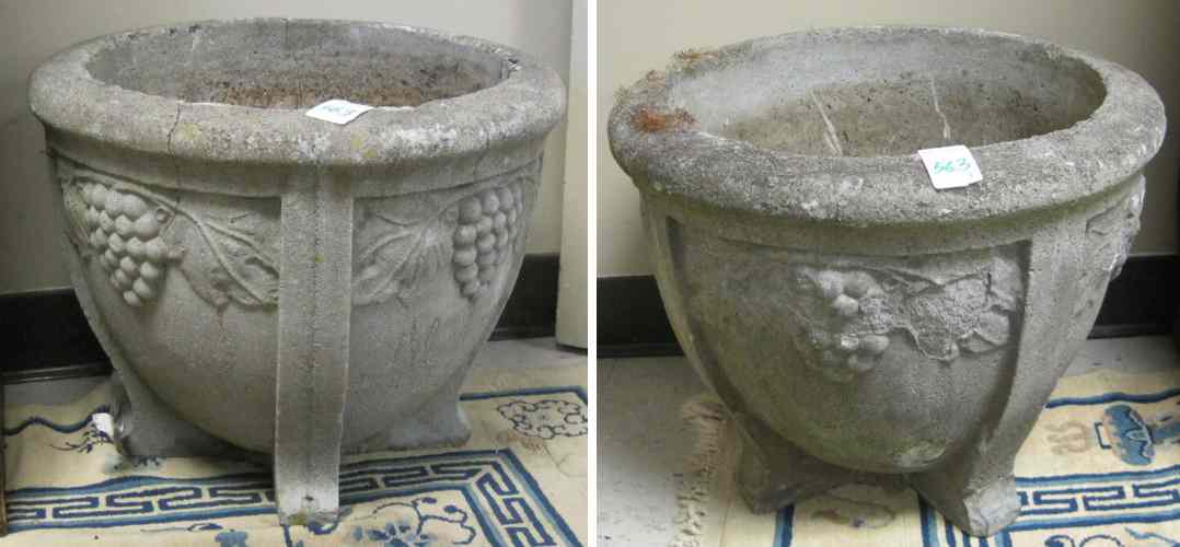 Appraisal: A PAIR OF CAST CONCRETE GARDEN PLANTERS of circular bowl