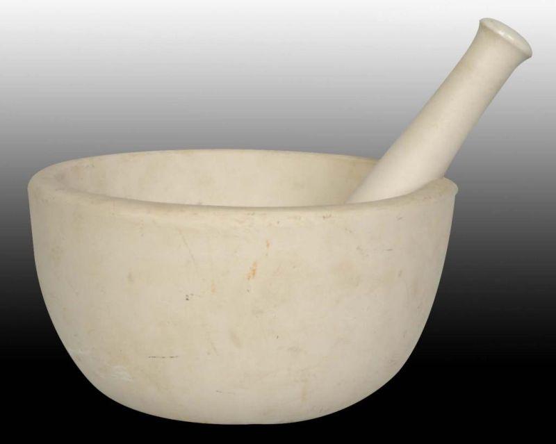 Appraisal: Large Mortar Pestle Description s to s Heavy soiling with