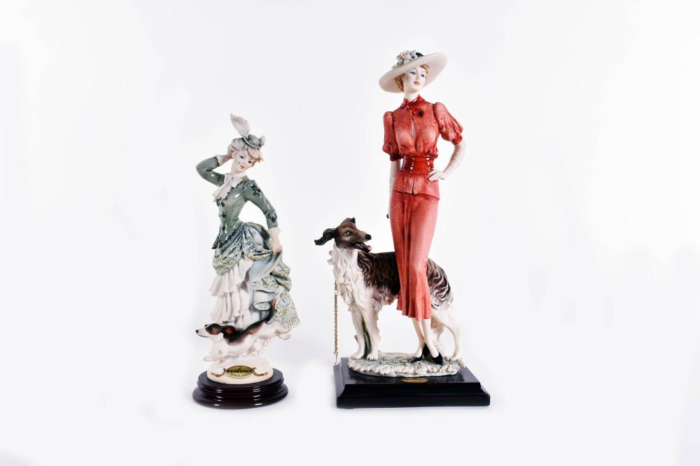 Appraisal: TWO GIUSEPPE ARMANI FASHION LADIES WITH DOGSMade For Capodimonte marked