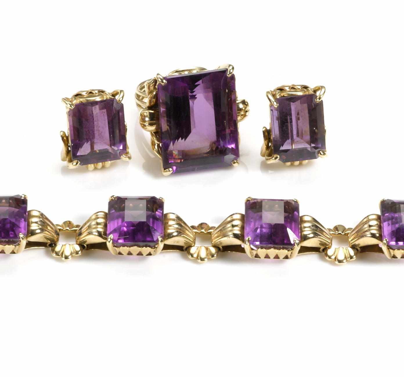 Appraisal: An amethyst jewelry set comprising a bracelet pair of screwback