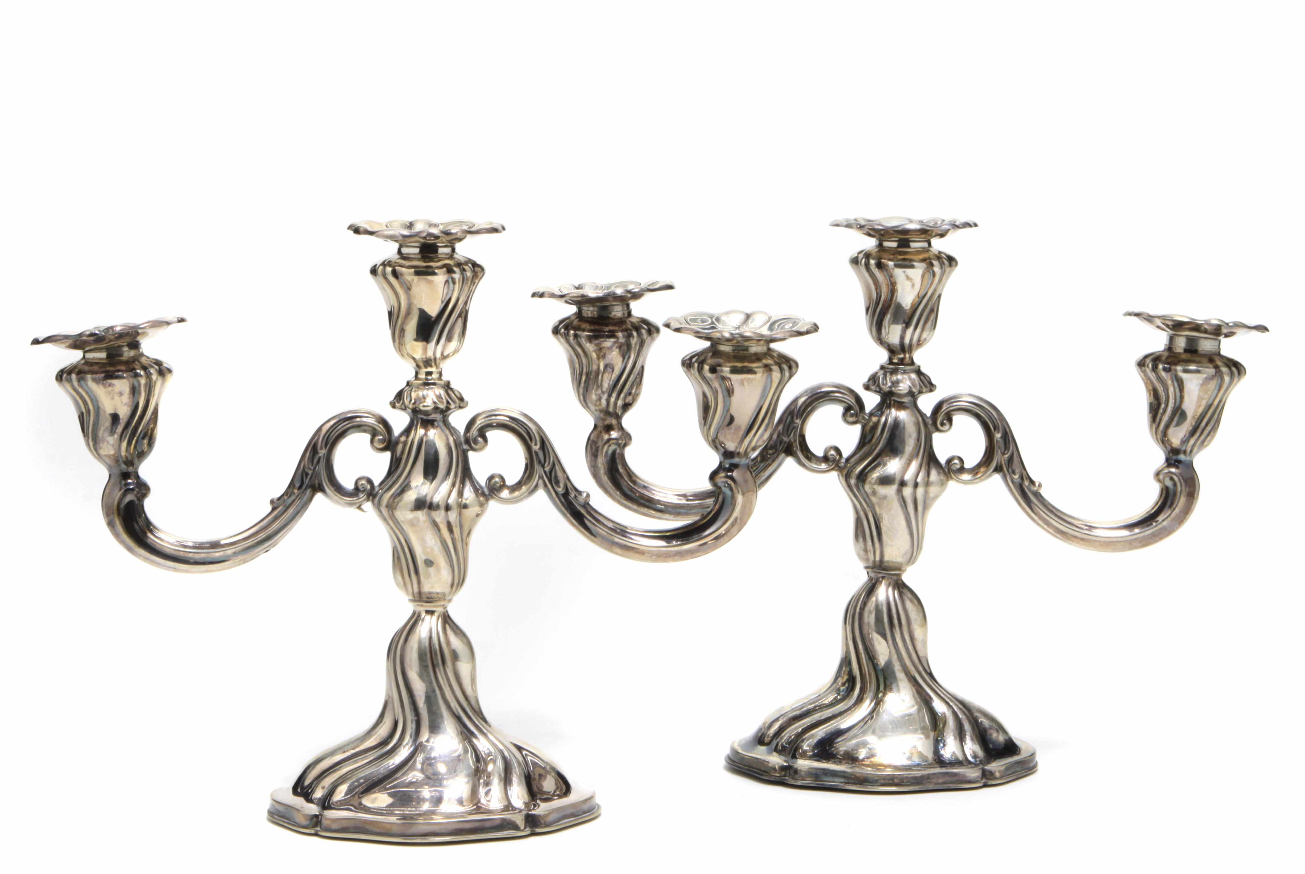 Appraisal: A pair of Continental standard silver three-light candelabra th century