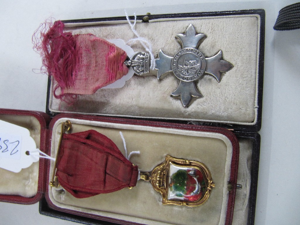 Appraisal: Lot comprising a cased MBE and a Glasgow Church medal