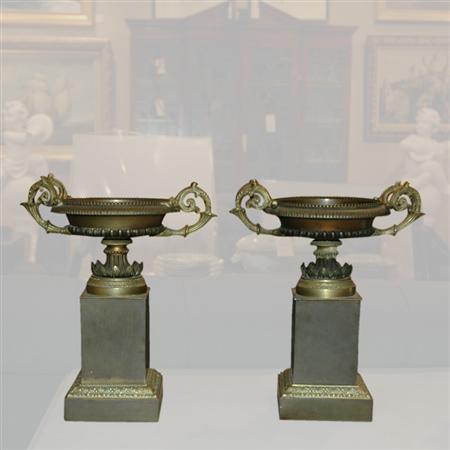 Appraisal: Pair of Restauration Style Gilt and Patinated-Bronze Urns on Pedestals