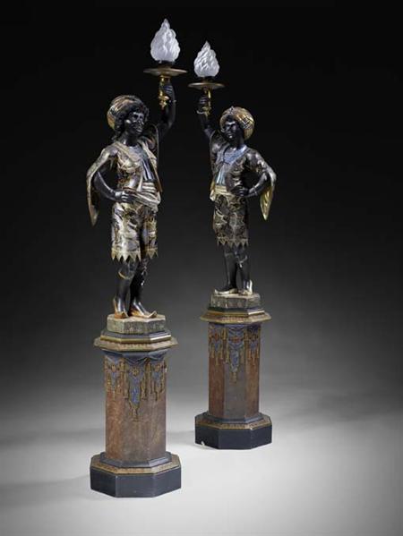 Appraisal: A pair of th century gilt and polychrome lacquer blackamoor