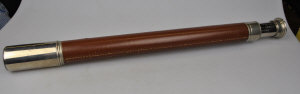 Appraisal: A single draw chrome and leather telescope by W Ottoway