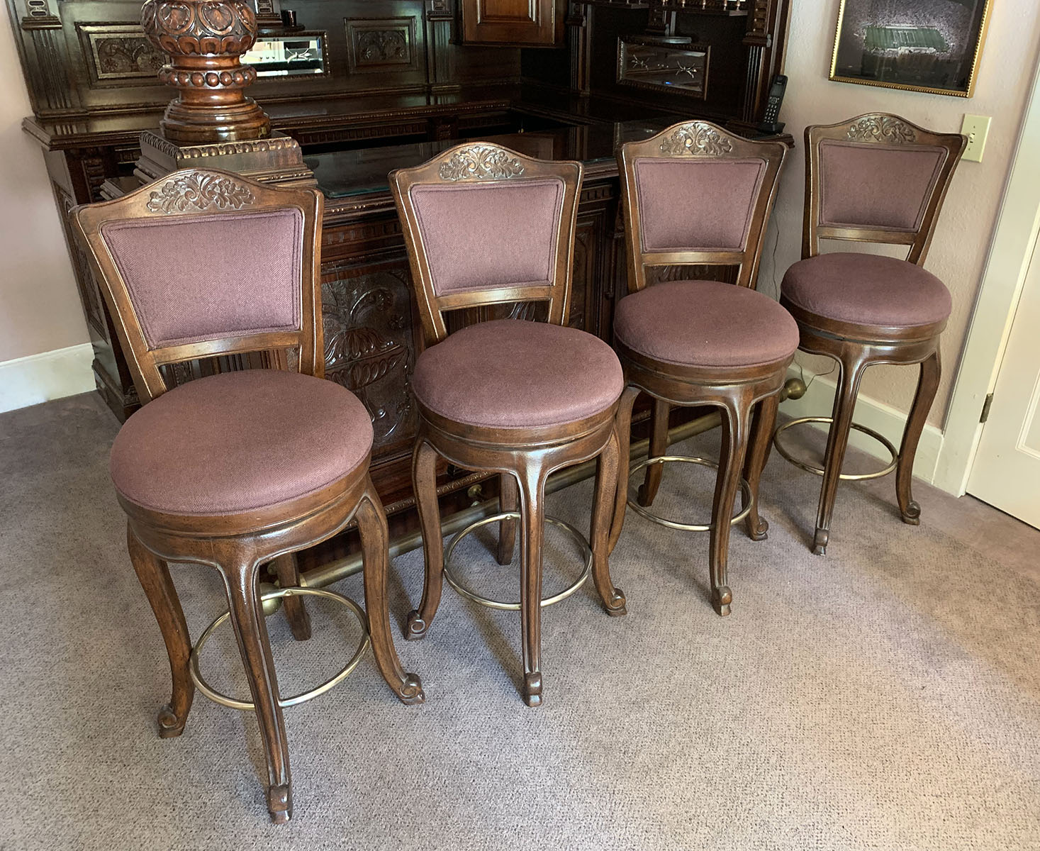 Appraisal: CARVED SWIVELING BAR STOOLS carved bar stools having a scrolling