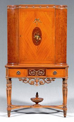 Appraisal: Adam style satinwood china cabinet single door opening to shelved