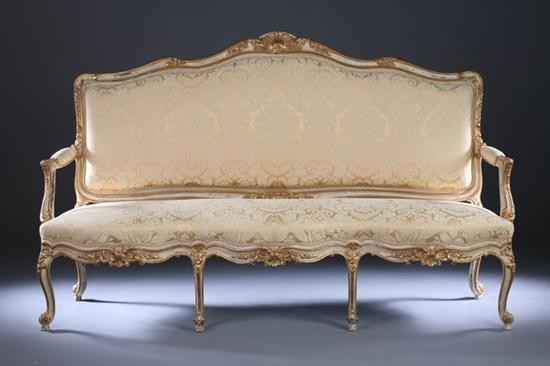 Appraisal: LOUIS XV STYLE PAINTED AND PARCEL-GILT CANAPE late th century