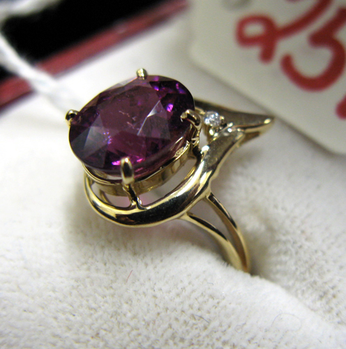 Appraisal: PURPLE TOURMALINE DIAMOND AND FOURTEEN KARAT GOLD RING set with