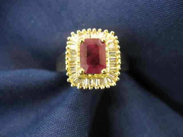 Appraisal: Ruby Diamond Ring carat emerald cut ruby surrounded by baguette