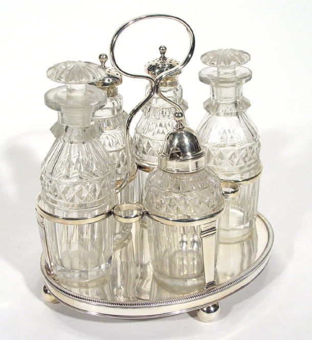 Appraisal: Matched Georgian silver five bottle cruet comprised five matching cut