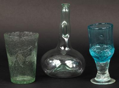 Appraisal: A green soda glass carafe with pinched neck cm high