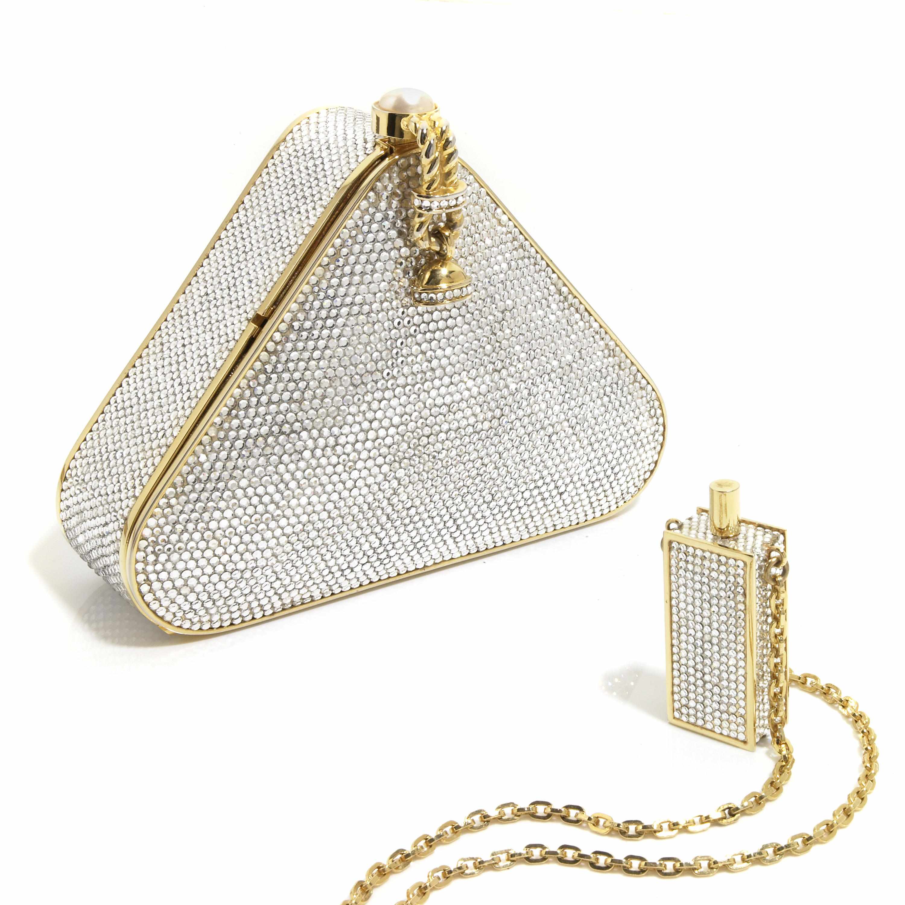 Appraisal: A triangular silver crystal purse with a simulated pearl and