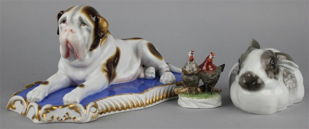 Appraisal: CONTINENTAL PORCELAIN MODEL OF A RECUMBANT DOG mid th century