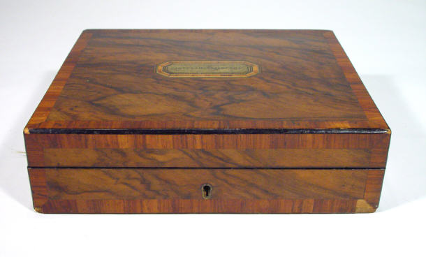 Appraisal: Victorian walnut handkerchief box the lid inset with a brass