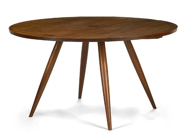 Appraisal: George Nakashima American - circular dining table walnut on turned