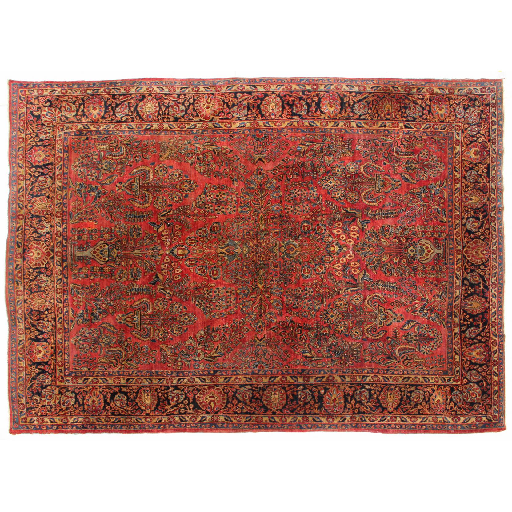 Appraisal: Persian Sarouk Carpet circa the wine field with central floral