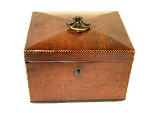 Appraisal: A George III mahogany tea caddy with inlaid decoration the