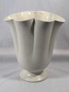 Appraisal: An Art Deco vase of fluted design by Fulham Pottery