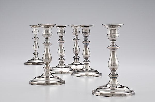 Appraisal: SIX EARLY SHEFFIELD CANDLESTICKS th century silver on copper baluster